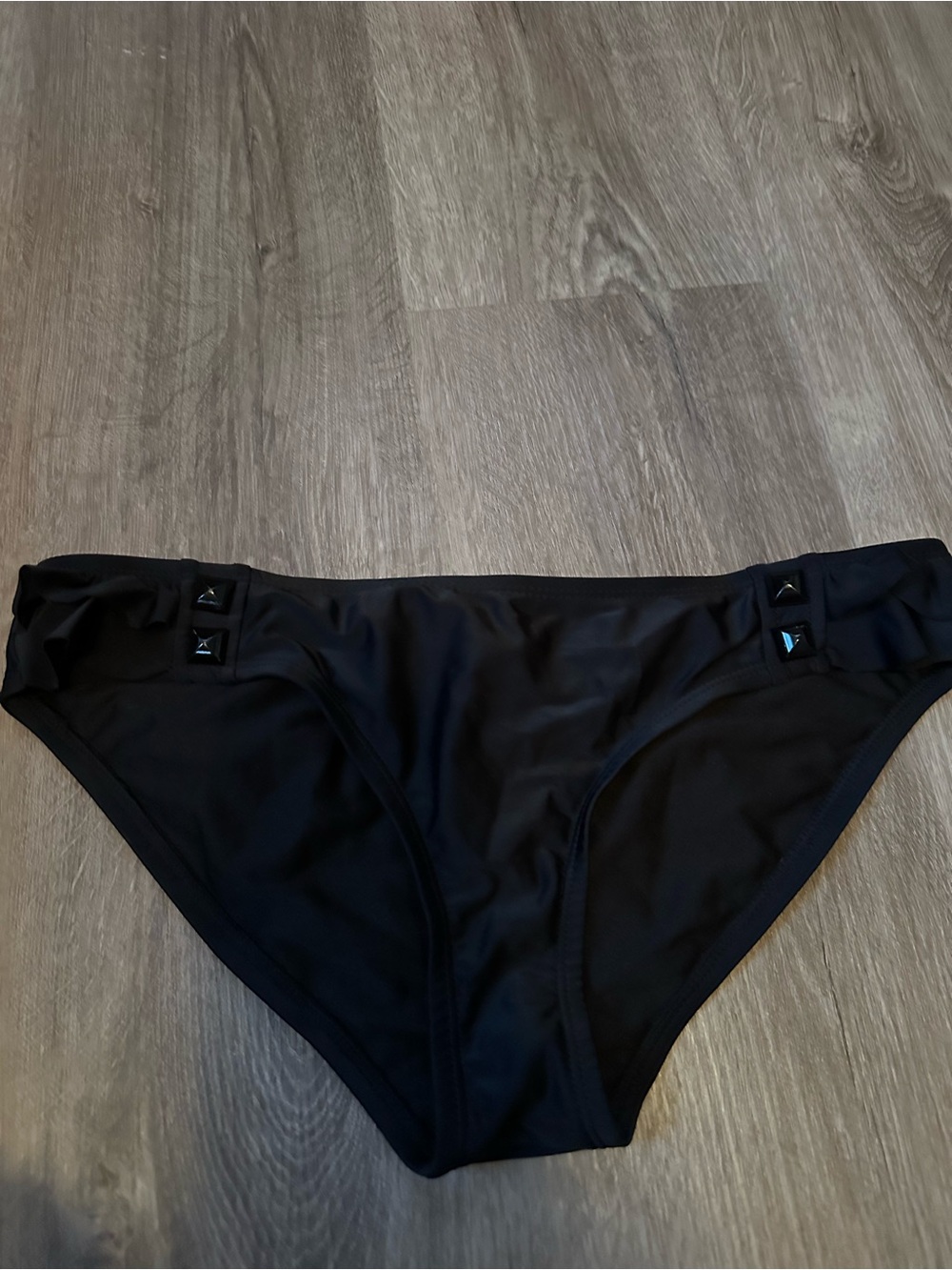 Classic Black Women’s Bikini Bottom with Stud and ruffle Detail